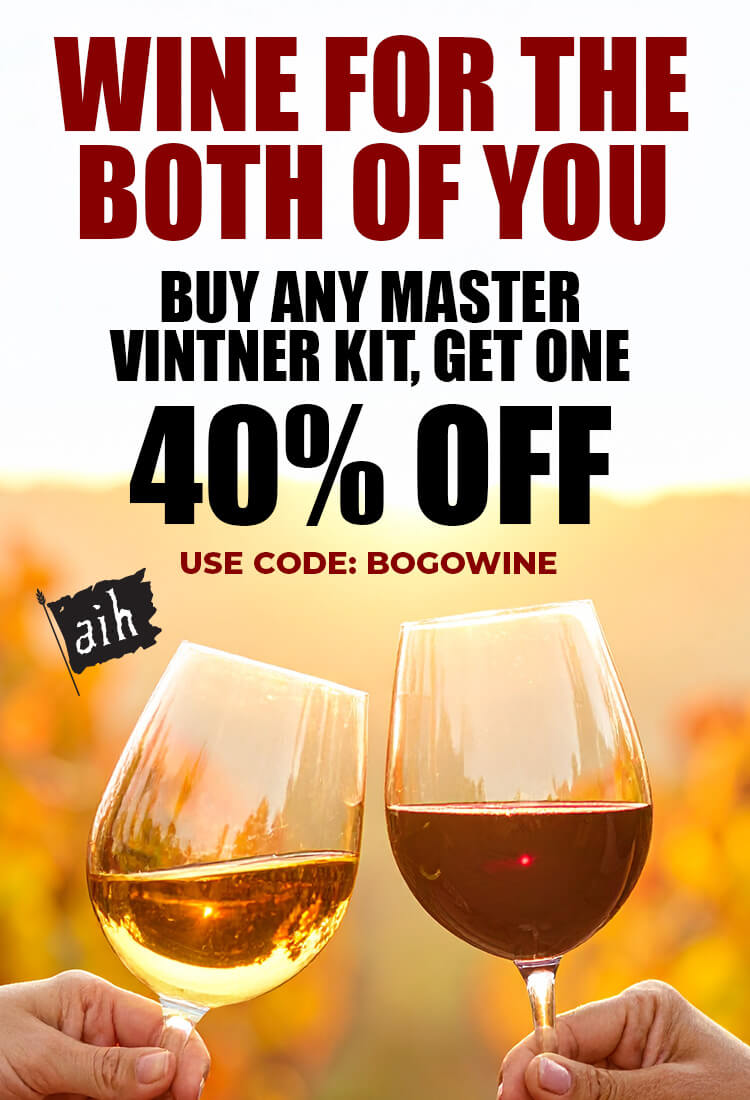 Promotional advertisement for wine kits with two glasses of wine against a blurred sunset background.