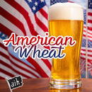 Glass of beer with 'American Wheat' text and American flags in the background