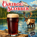 Glass of brown ale with a caribou in a mountainous landscape, featuring the brand 'Caribou Slobber'.