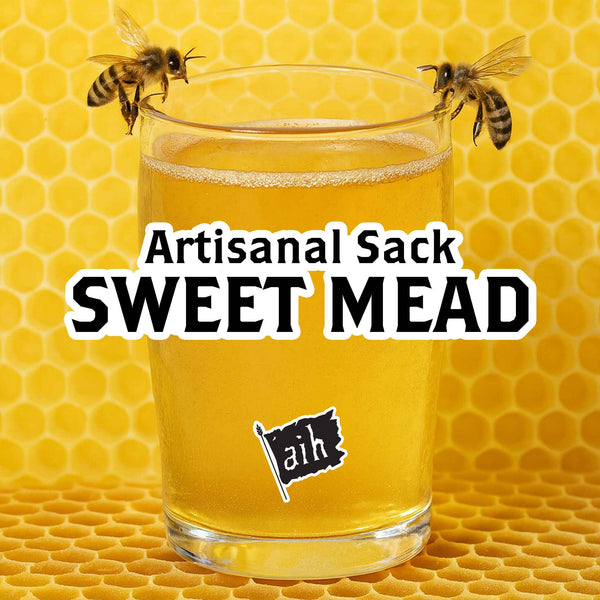 Glass of artisanal sweet mead with bees on a honeycomb background