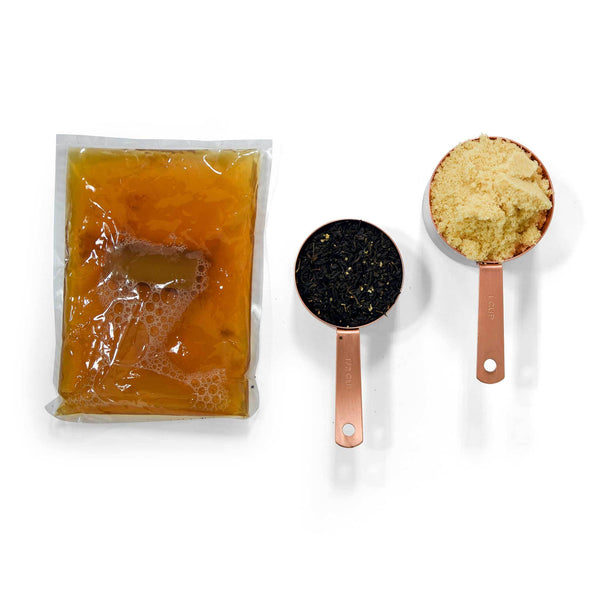 Belgian Berry Kombucha Kit showing its tea blend, proprietary sugar blend, and freshly harvested SCOBY